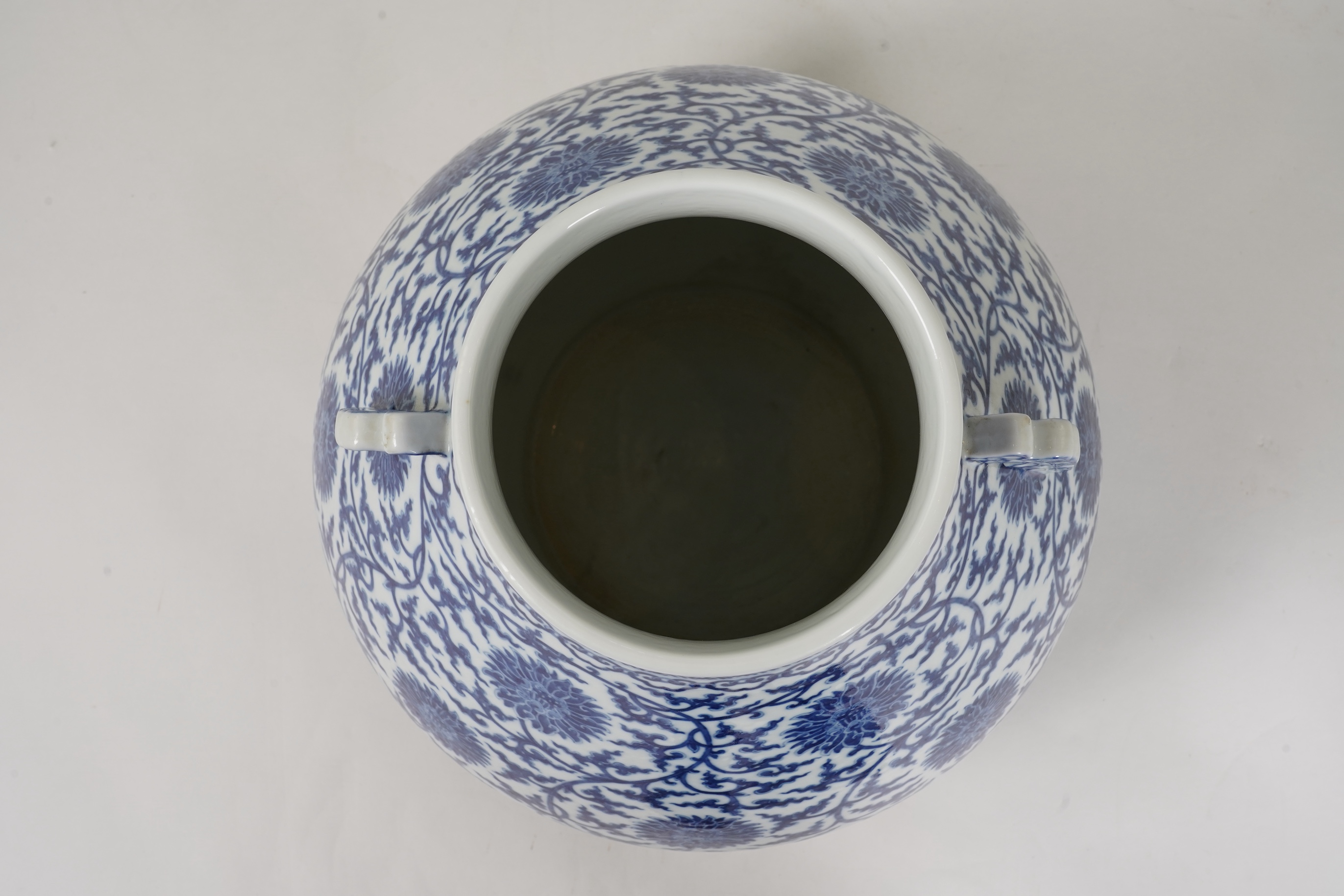 A large Chinese blue and white pear shaped vase, hu, Qianlong seal mark but later